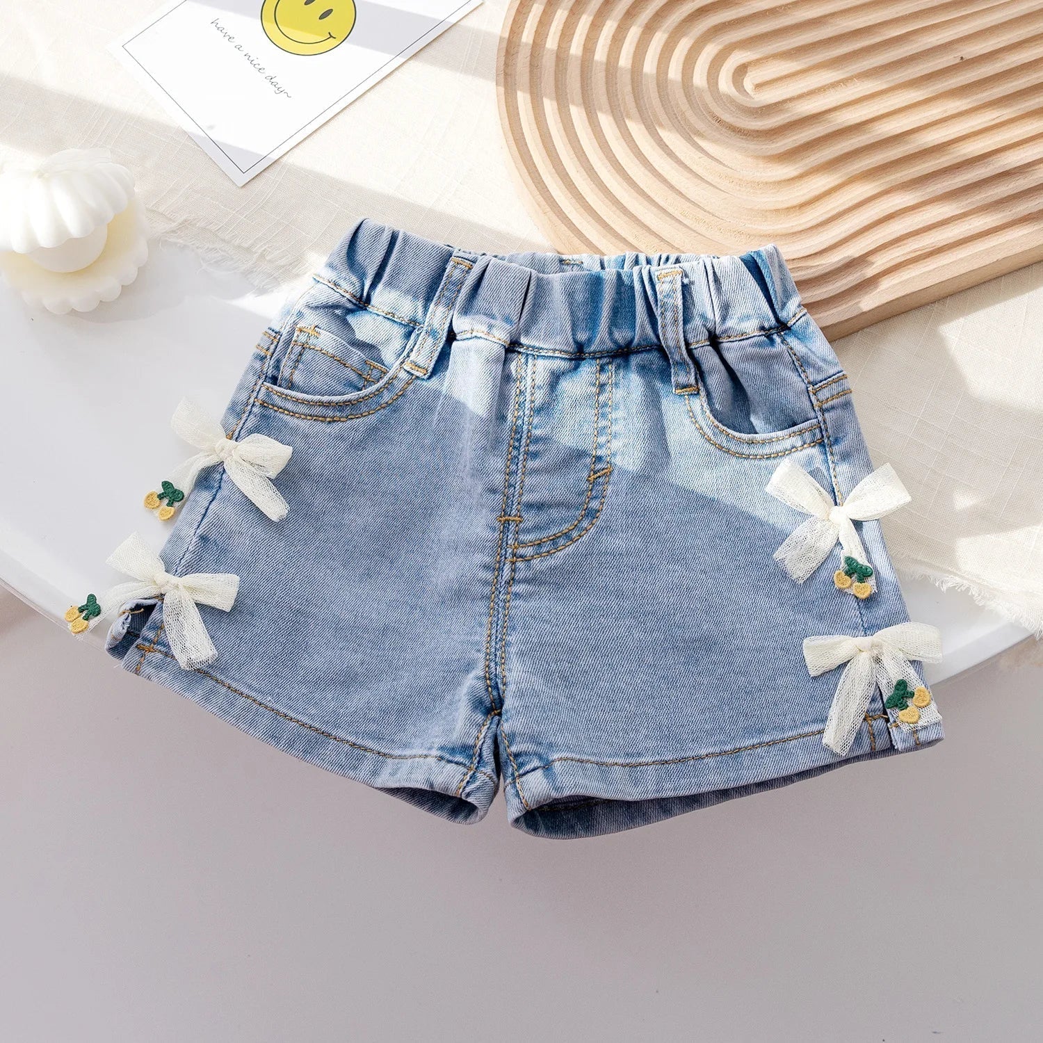 Shorts Infantil Feminino Jeans Lacinhos - BABYLIFEBabyLifeBABYLIFE6 - 12 MesesShorts Infantil Feminino Jeans Lacinhos